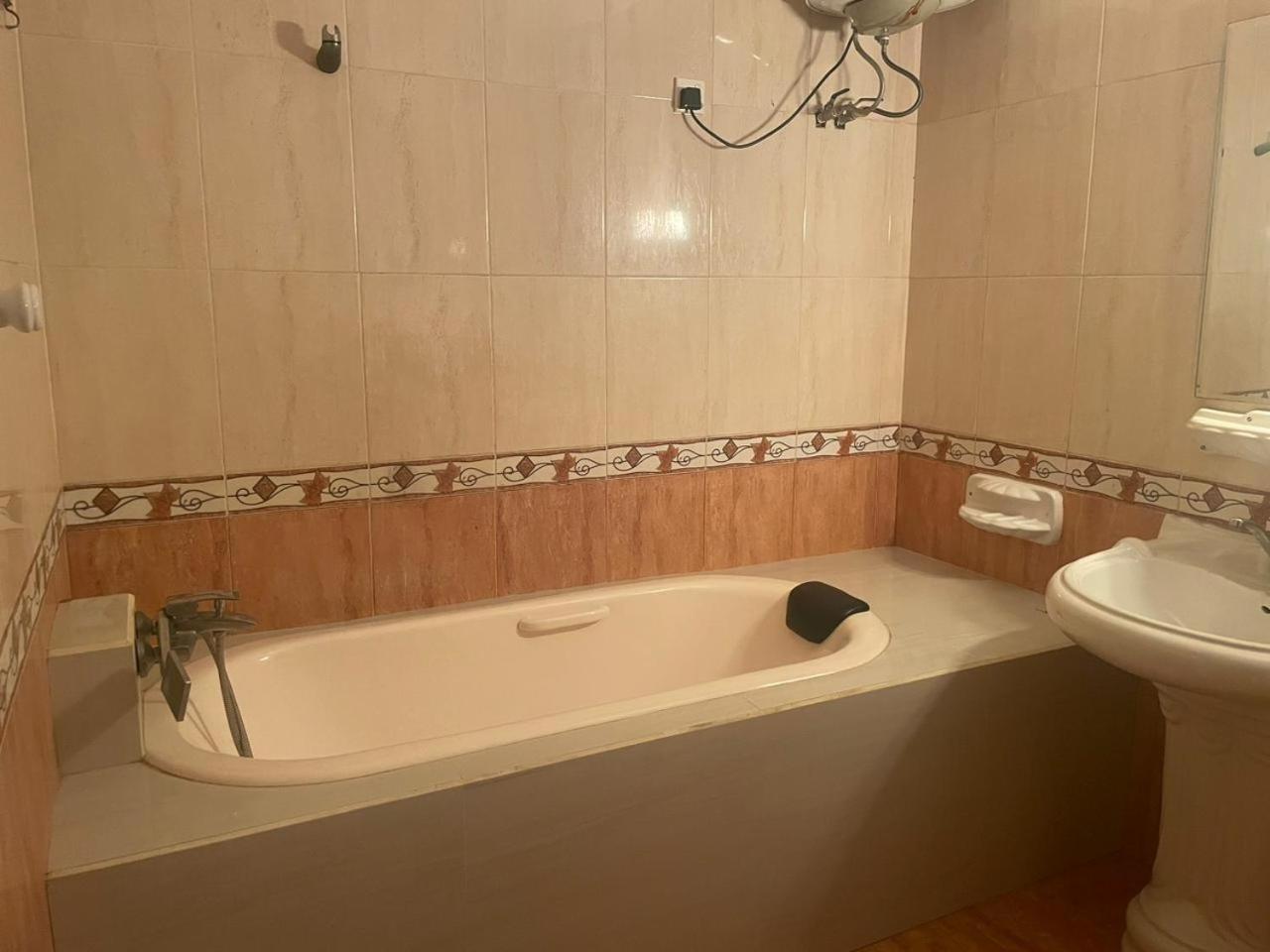 Queen Room with Shared Bathroom